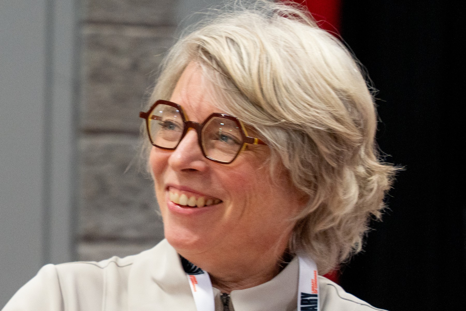 Jill Lepore smiling, in glasses, at a book festival